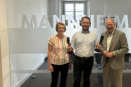 Moderator Jens Schneider im Gespräch mit Andrea Böttger, Bauprojektleiterin der SBN bei der rnv und Christian Specht, Oberbürgermeister der Stadt Mannheim