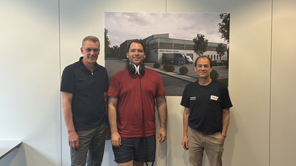 Moderator Jens Schneider im Gespräch mit Rolf Wenig, Projektleiter und stellvertretender Abteilungsleiter Hochbau bei der rnv und Jens Guder, Leiter Ausbildung und Fahrschule 